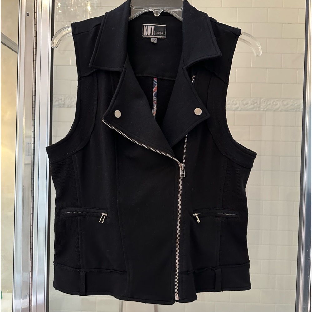 Fun, little bit of rock and roll, asymmetric zipper vest. Soft thick stretch